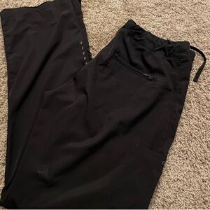 2 pairs of Barco scrub pants size medium.